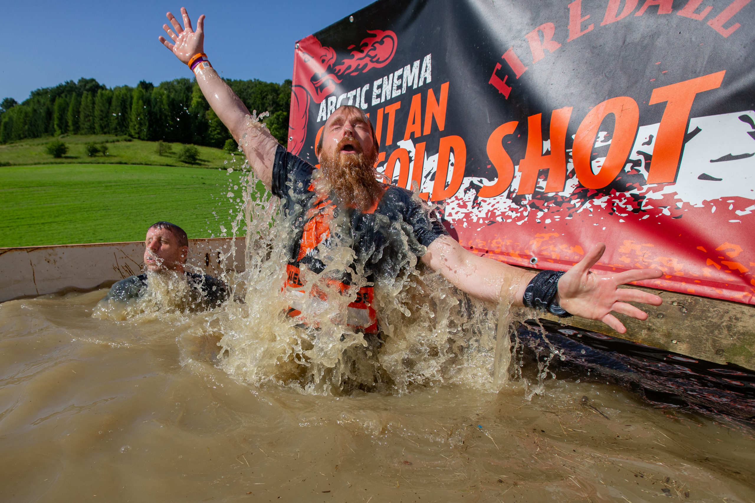 Two participants submerged in Arctic Enema