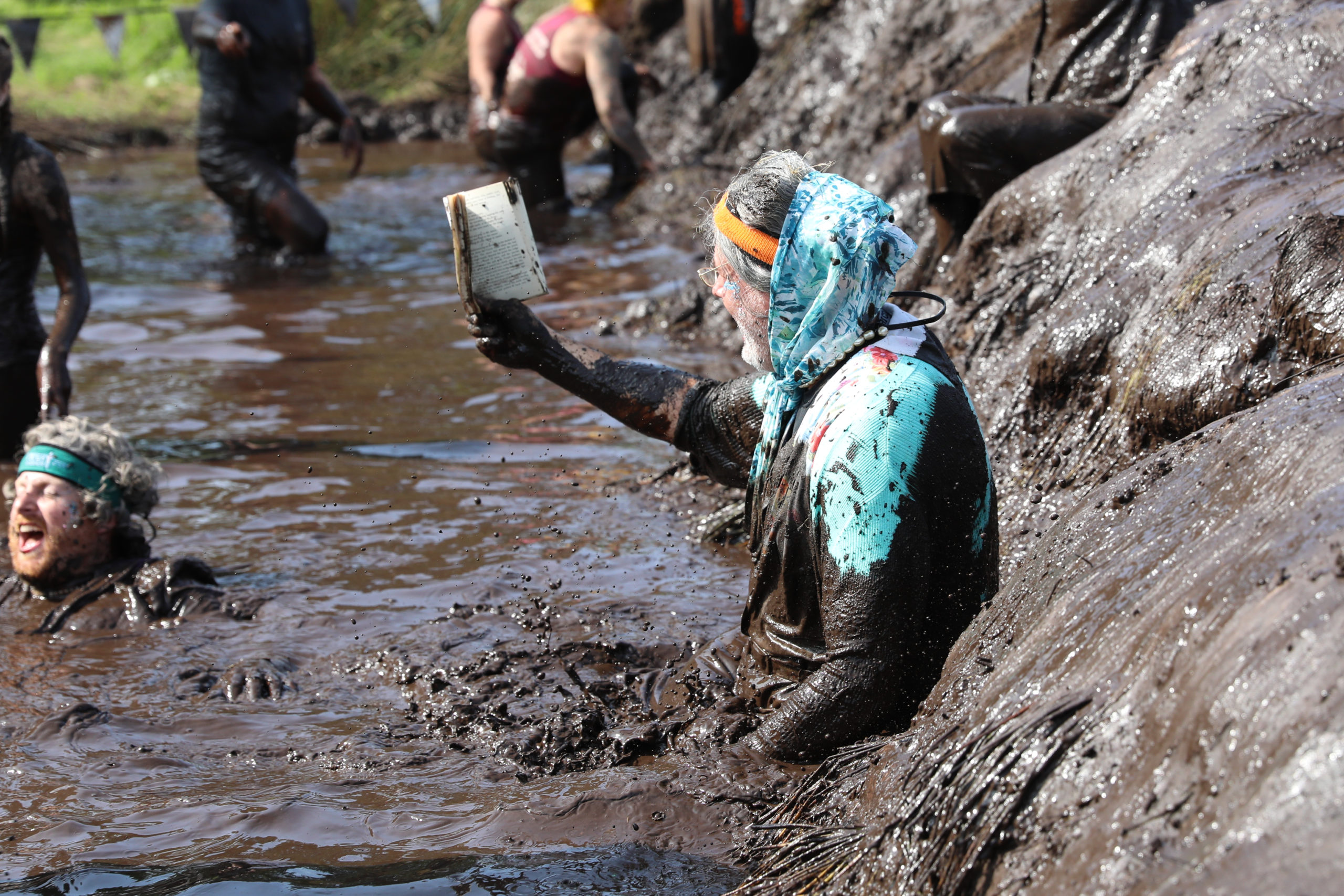 grandma in mud obstacle