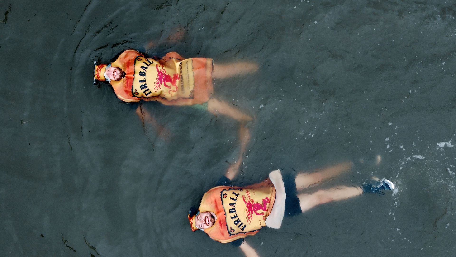 men in fireball suits