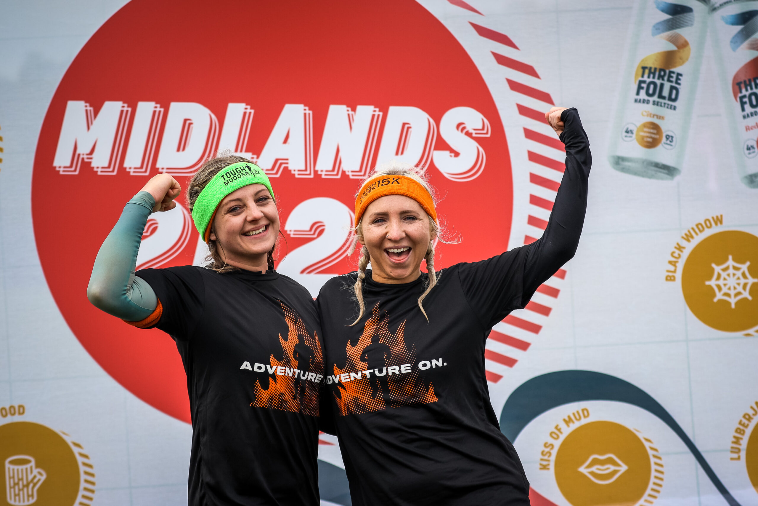 two girls in finisher shirts