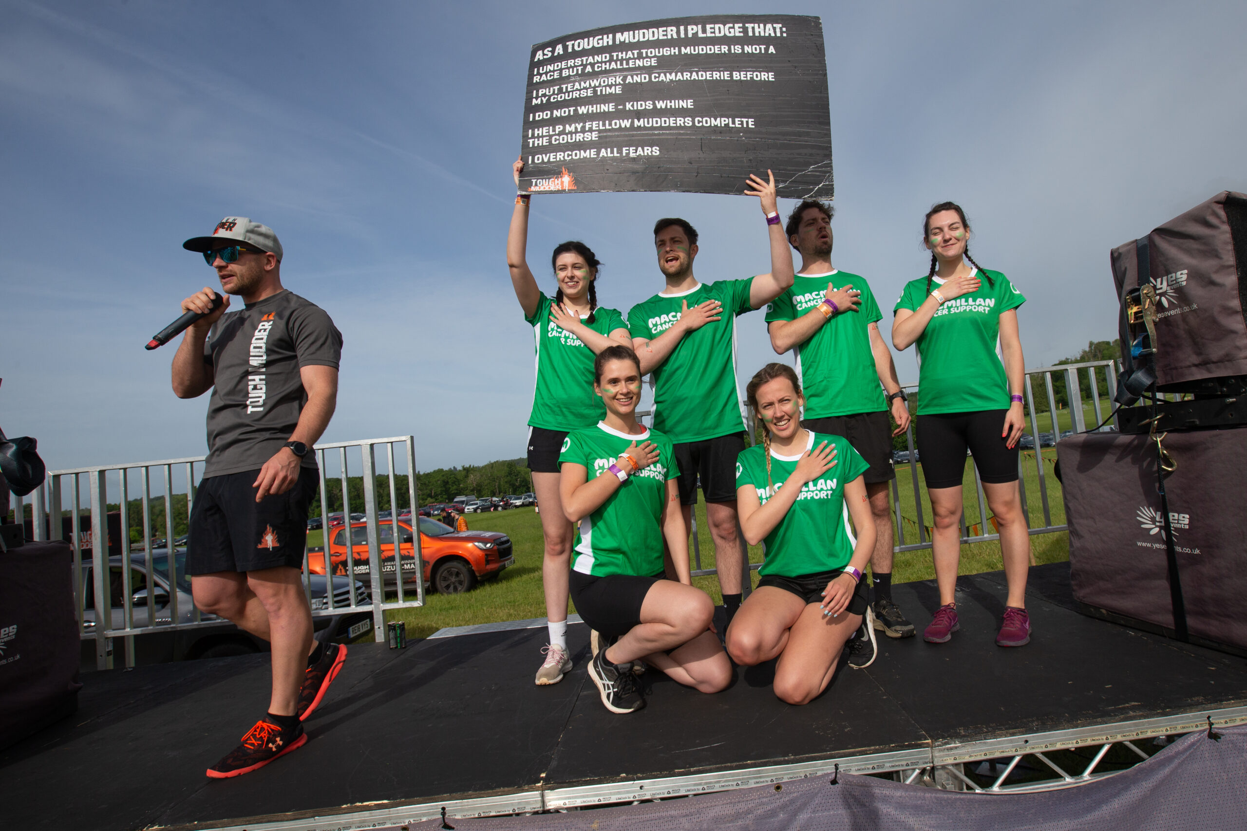 Macmillan team members tough mudder pledge