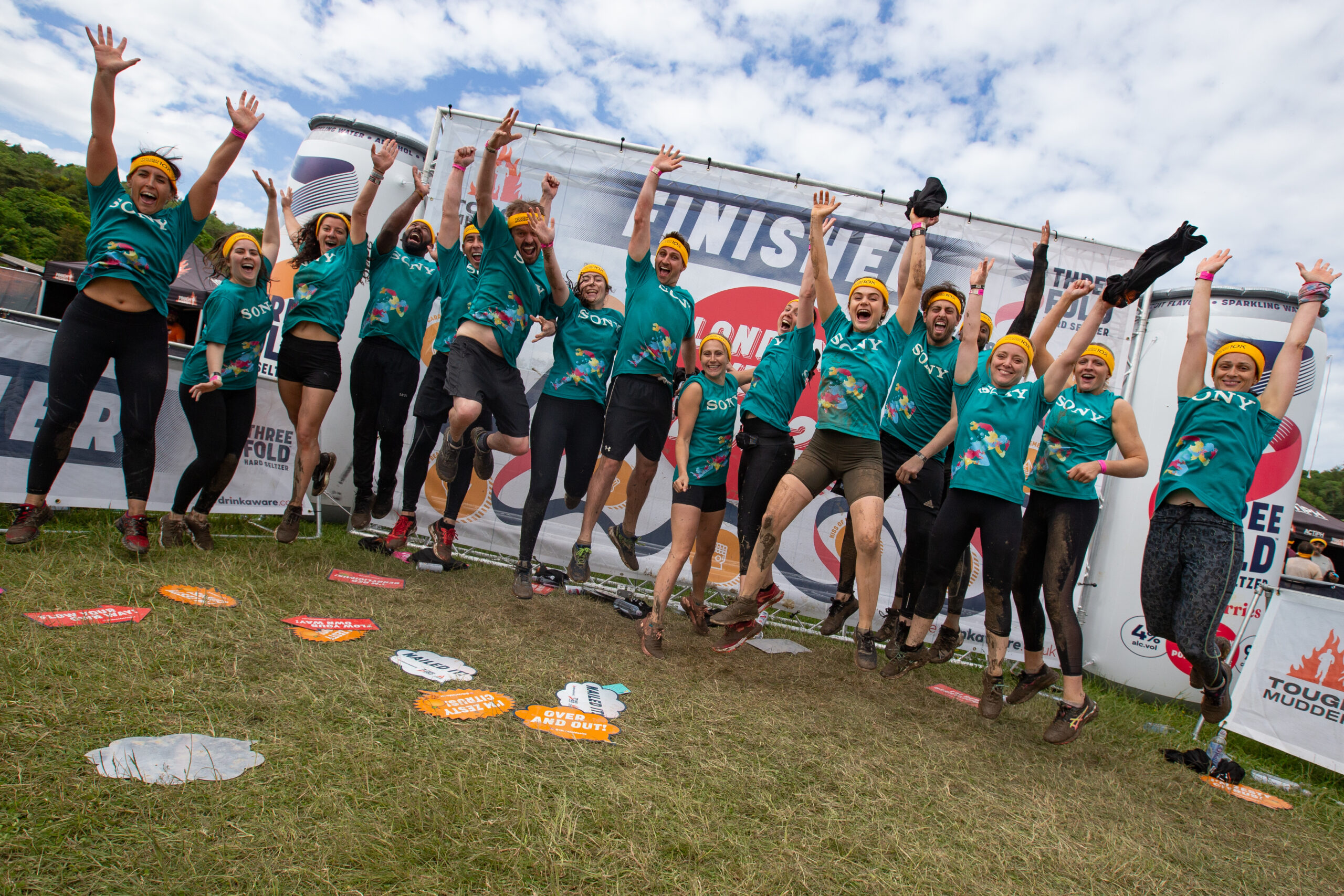 team jumping at London West Tough Mudder